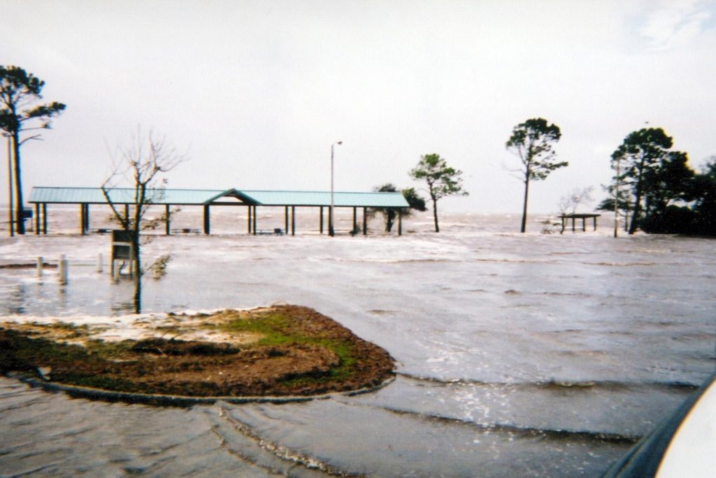 The flooded parking lot next to Tower 2