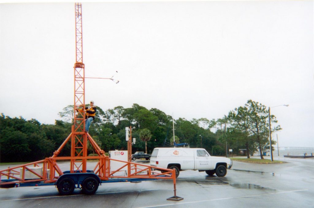 Side shot of Tower 2 with truck in the background